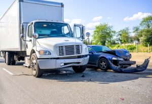 semi smashes car
