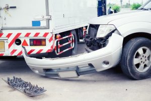 truck hits car